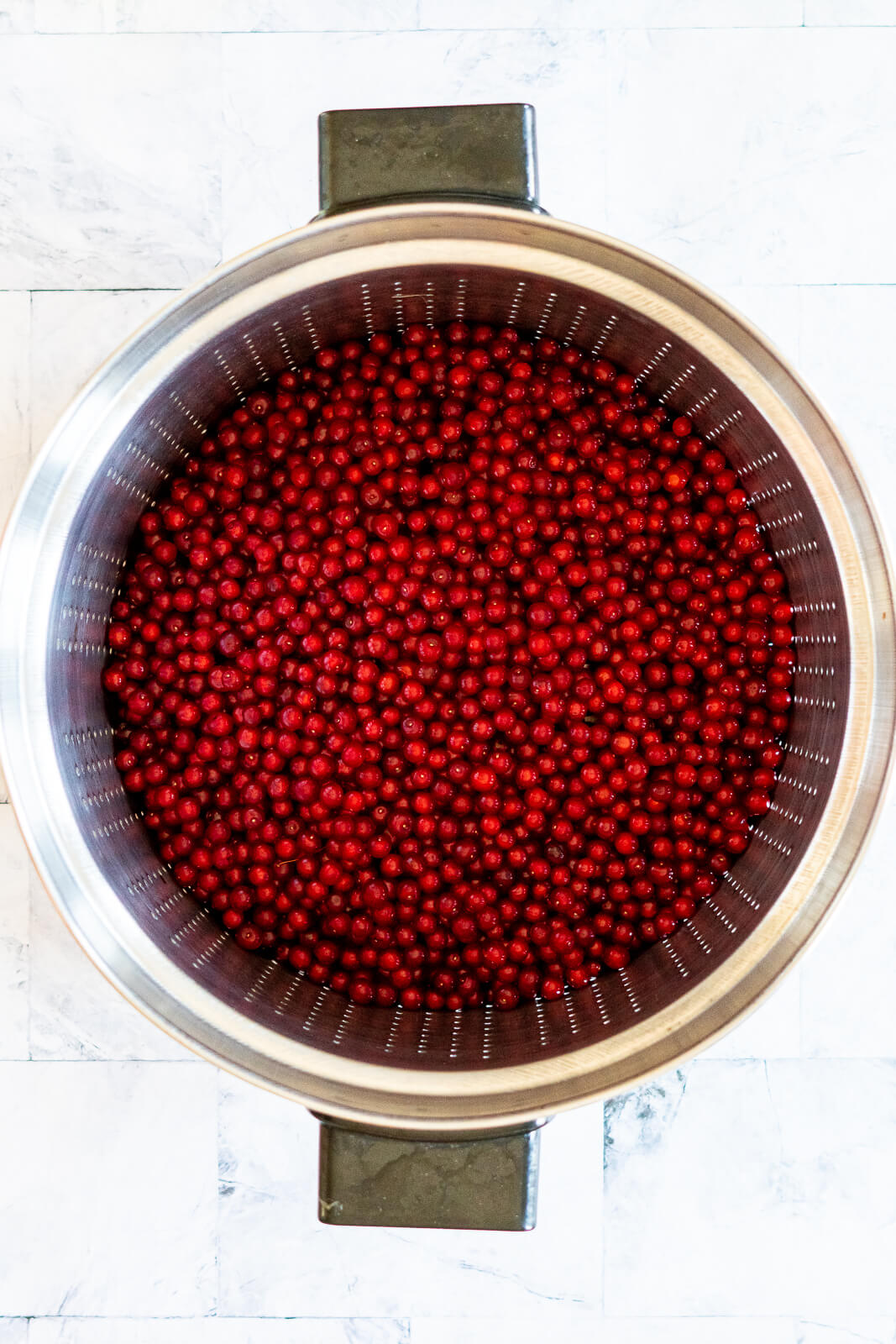 Pin cherries in a steam juicer. 