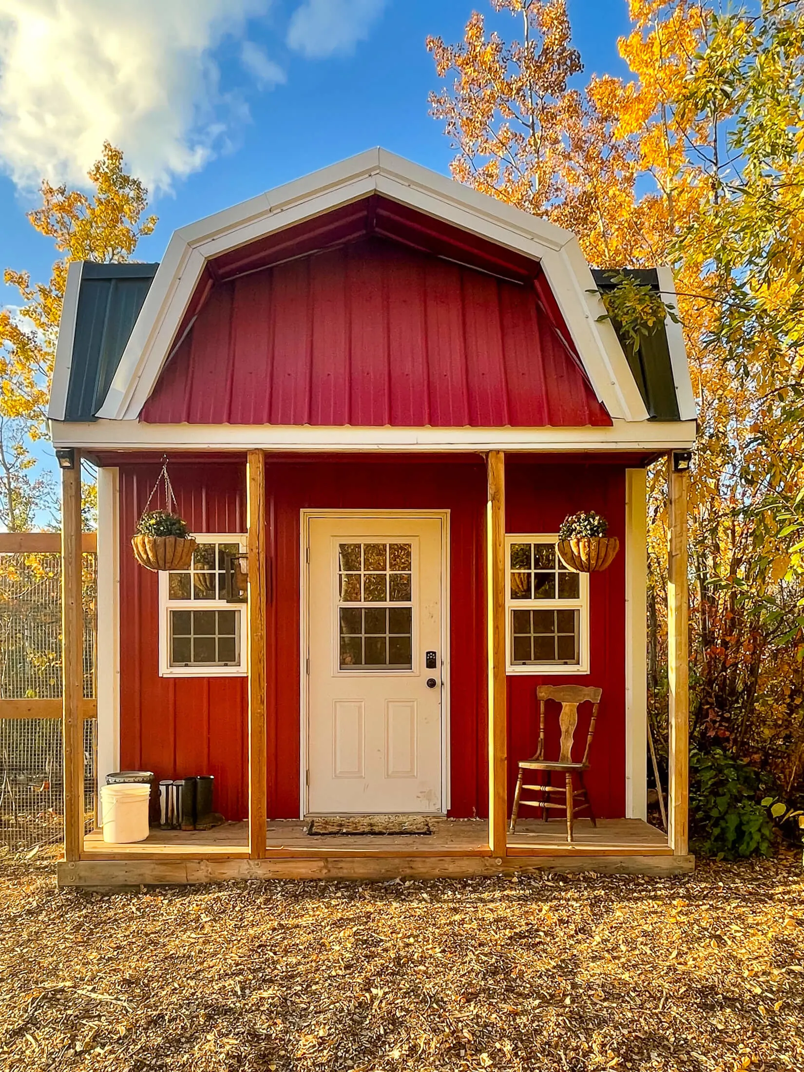 Red barn style chicken coop.