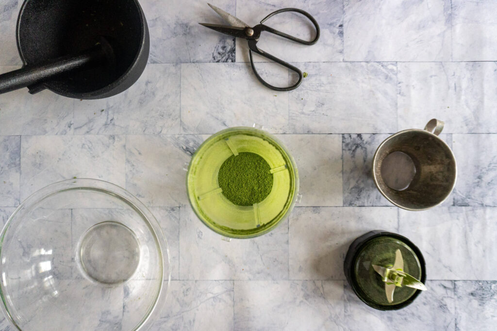 Dried comfrey leaves after blending. 