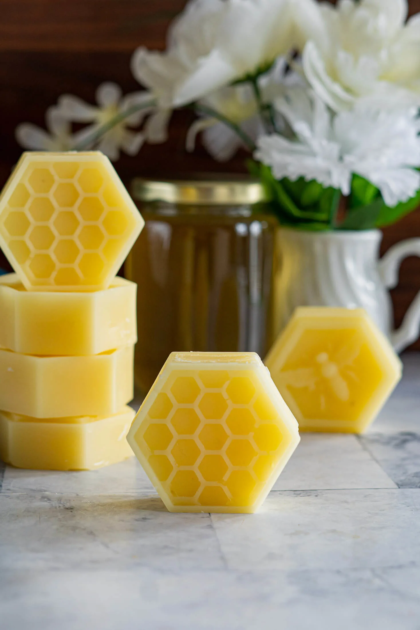Melted beeswax after being cooled in hexagon forms. 